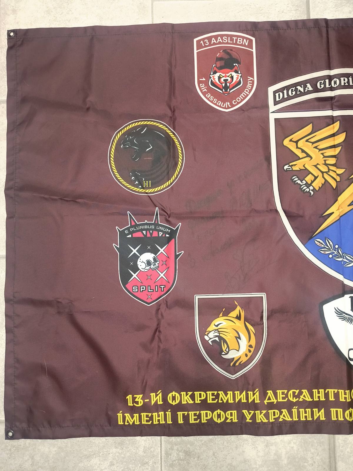 Ukrainian flag signed by fighters of 13th Airmobile Battalion - Image 2