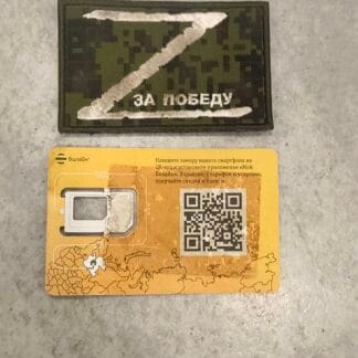 Trophy KIA Chevron Patch and sim-card from same owner